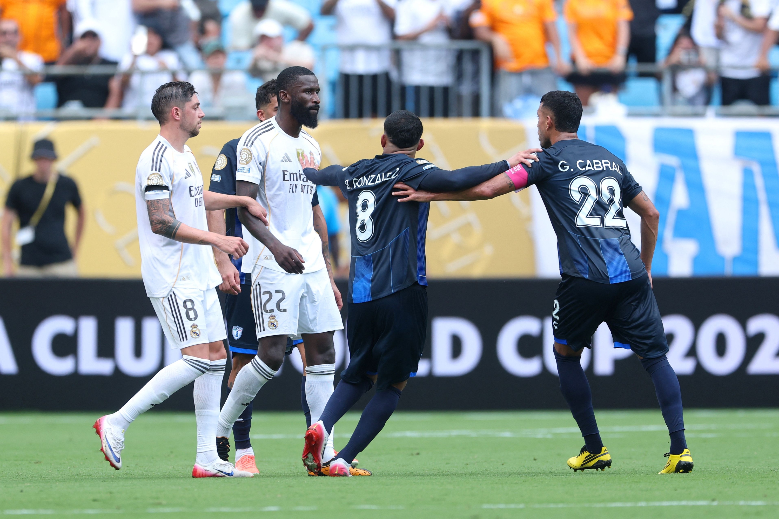 Charlotte, North Carolina - June 22: Bryan Gonzalez #8 of CF Pachuca Separates Antonio Ruediger #22 of Real Madrid CF from Gustavo Cabral #22 of CF Pachuca During the Fifa Club World Cup 2025 Group H Match Bethaeen Real Madrid Cf and CF Pachuca At Bank of America Stadium on Junne Junne 22, 2025 in Charlotte, North Carolina. Richard Pelham / Getty Images / AFP (Photo by Richard Pelham / Getty Images North America / Getty Images Via AFP)