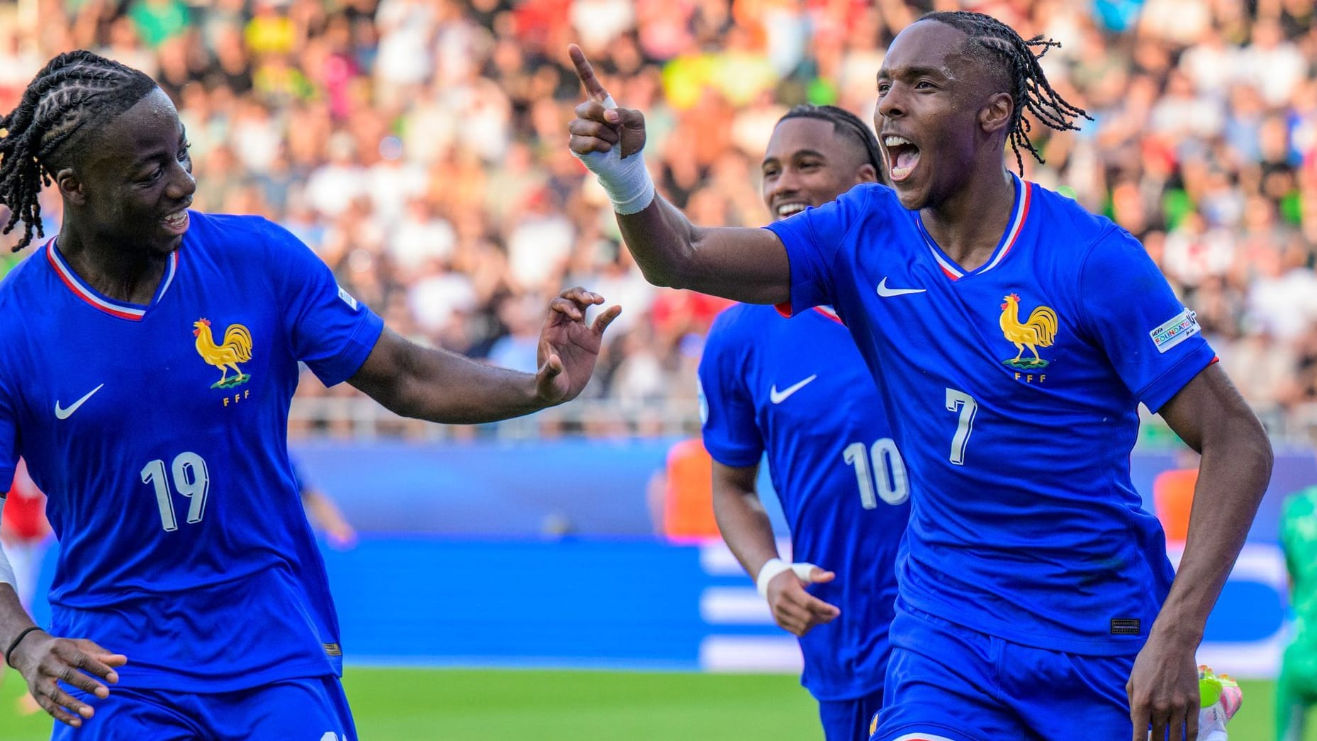 Match winner: France Mathys Tel (right) celebrates his goal to 3-2.