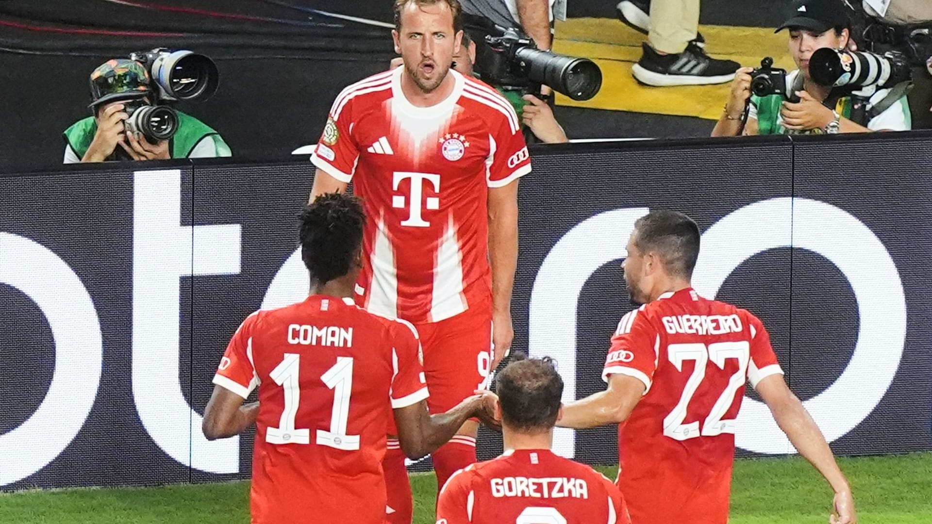 Harry Kane cheers after the winning goal.