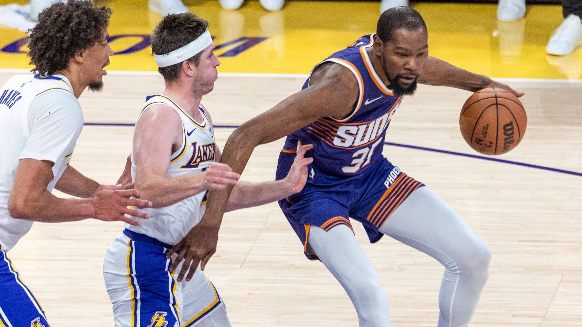 Soon no longer in the Suns jersey? Kevin Durant (right) is about to say goodbye to Phoenix.