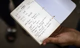 A notebook to learn Dutch from an asylum seeker at the registration center in Ter Apel.