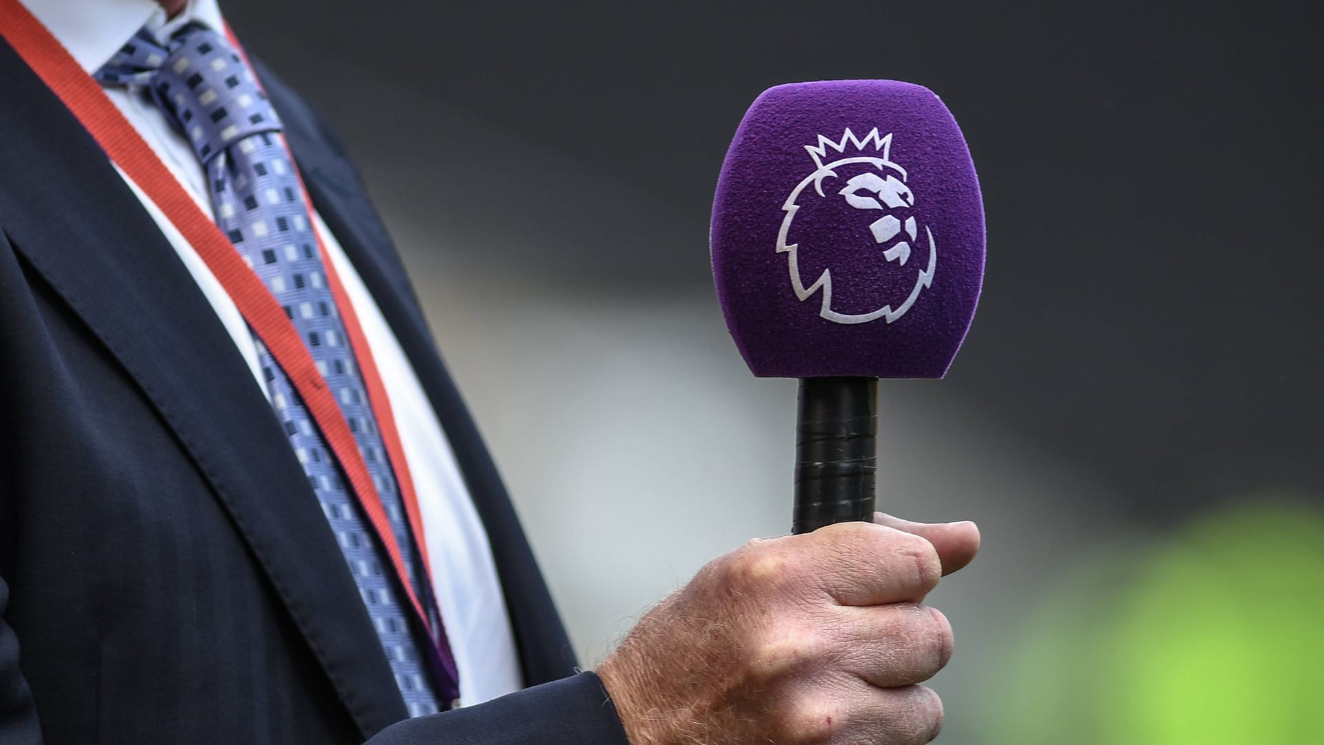 Premier League logo on a microphone: The highest English division was created in 1992 from the First Division.
