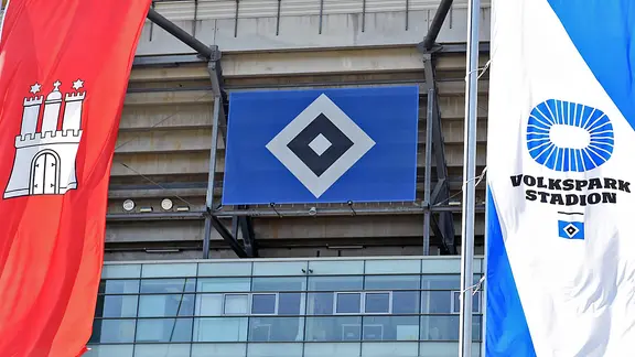 The Hamburg flag in front of the HSV folk park stadium