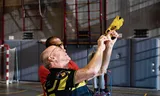 Instructor Michael Huijs (with Red Polo) gives agents instructions for the use of a power surge weapon.
