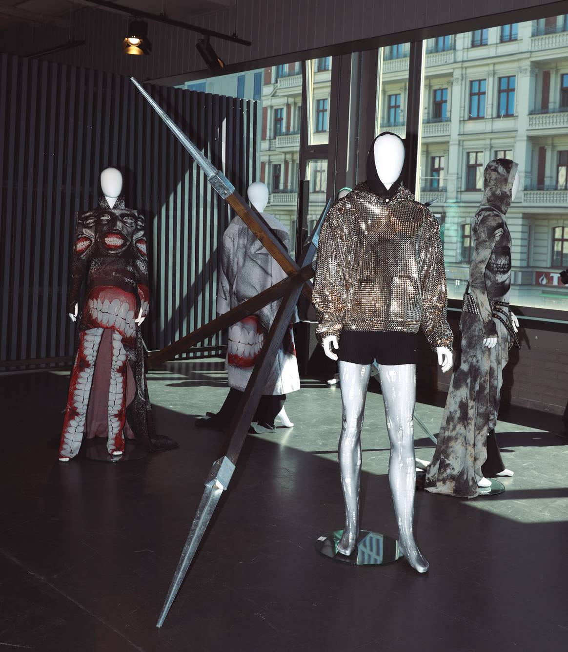The installation of the label ID merges the knight figure with digital inspired prints.
