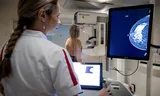 Making an X -ray scan for breast cancer testing. 