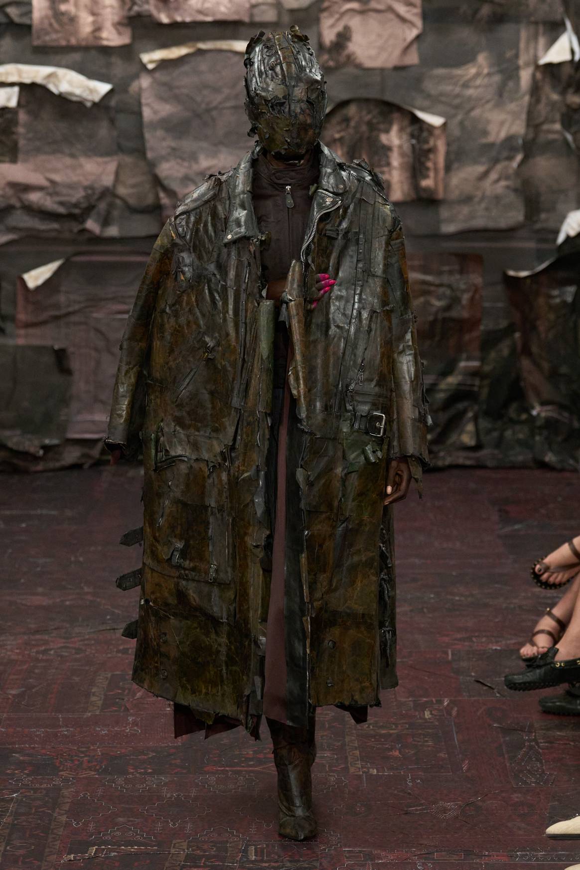 Look 14: Upcycled biker jackets in a patchwork style.