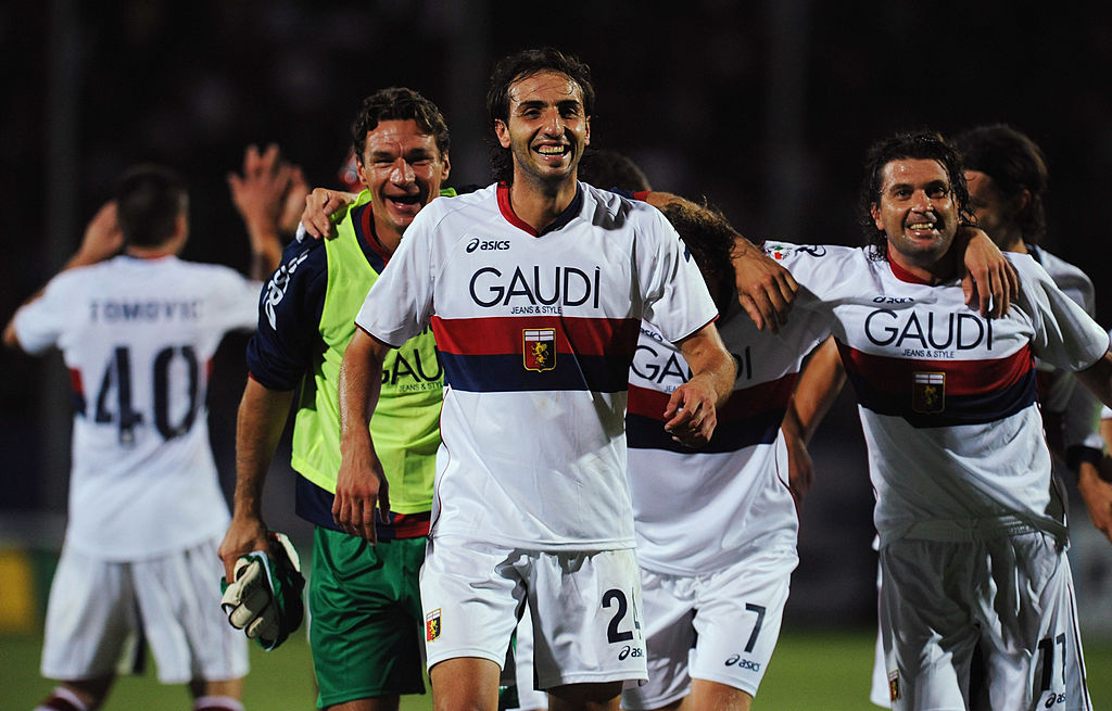 Bergamo, Italy - August 30: Emiliano Moretti (C), Alessio Scarpi (L) and Omar Milanetto of Genoa CFC celebrated Victory During the Serie A Match Bethaeen Atalanta BC and Genoa CFC at Stadio Atleti Azzurri d'Italia on August 30, 2009 in Bergamo, Italy. (Photo by Valerio Pignicino/Getty Images)