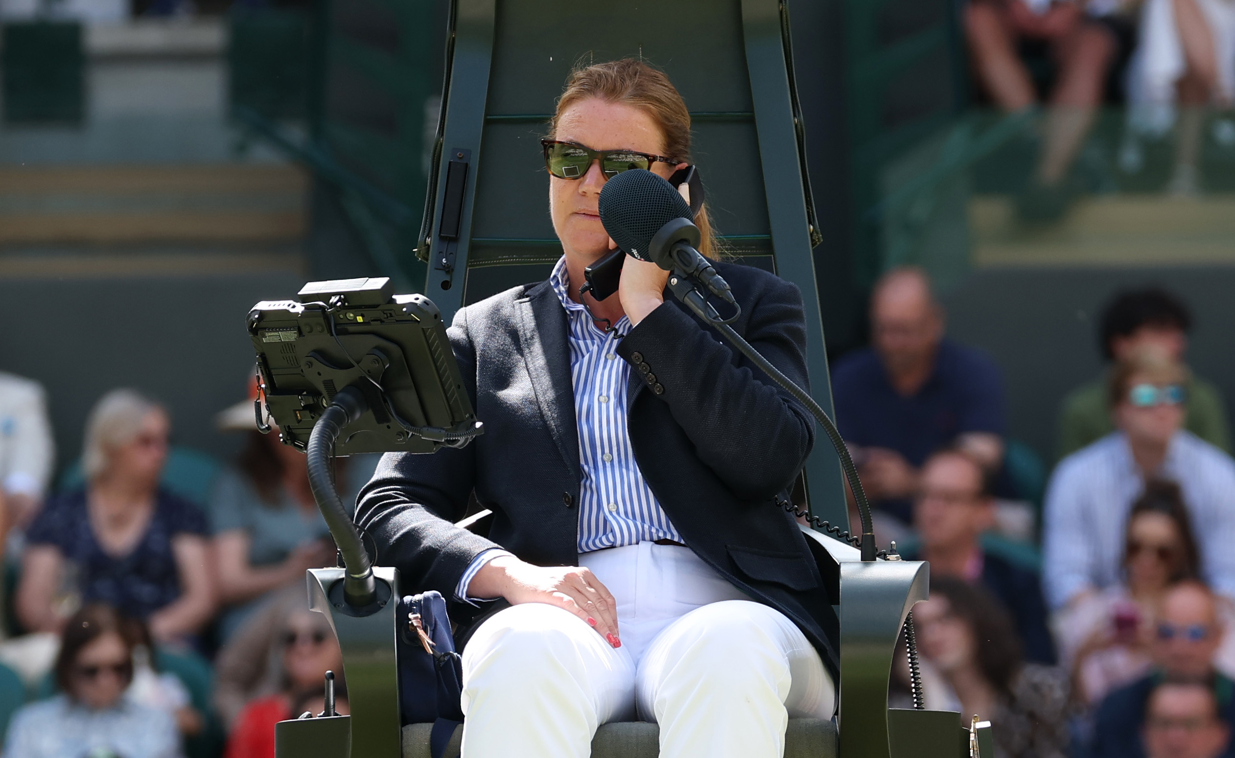 London, England - July 08: Chair Umbre, Louise Azemar -Engzell Use the Telephone During the gentleman's singles Quarter Final Match Bethaeen Taylor Fritz of United States and Karen Khachanov on Day Nine of the Championship Wimbledon 2025 at All England Lawn Tennis and Croquet Club ON July 08, 2025 in London, England. (Photo by Clive Brunskill/Getty Images)