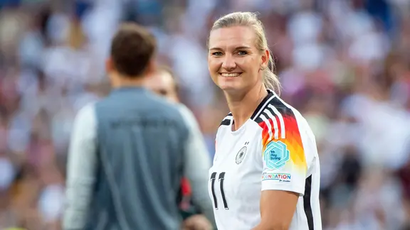 Alexandra Popp smiles.