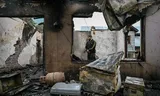 A man is in his house that was destroyed on May 8, 2025 by Pakistani artillery shoots in the village of Salamabad. Photo Sajjad Hussain / AFP   