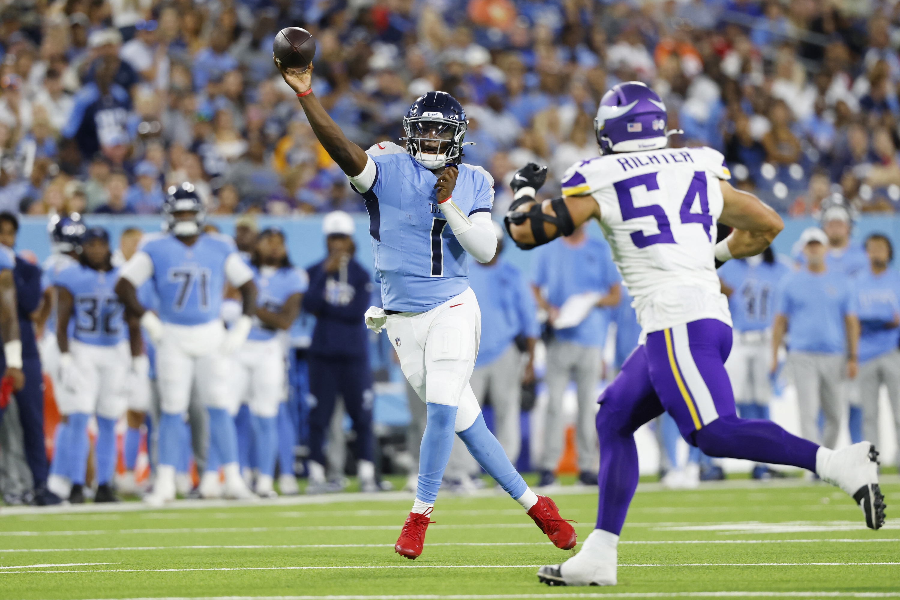 Nashville, Tennessee - August 22: Cam Ward #1 of the Tennessee Titans Drops Back To Throw A Pass During the First Half of the NFL Nurse 2025 Game Against The Minnesota Vikings at Nissan Stadium on August 22, 2025 in Nashville, Tennessee. Johnnie Izquierdo / Getty Images / AFP (Photo by Johnnie Izquierdo / Getty Images North America / Getty Images Via AFP)