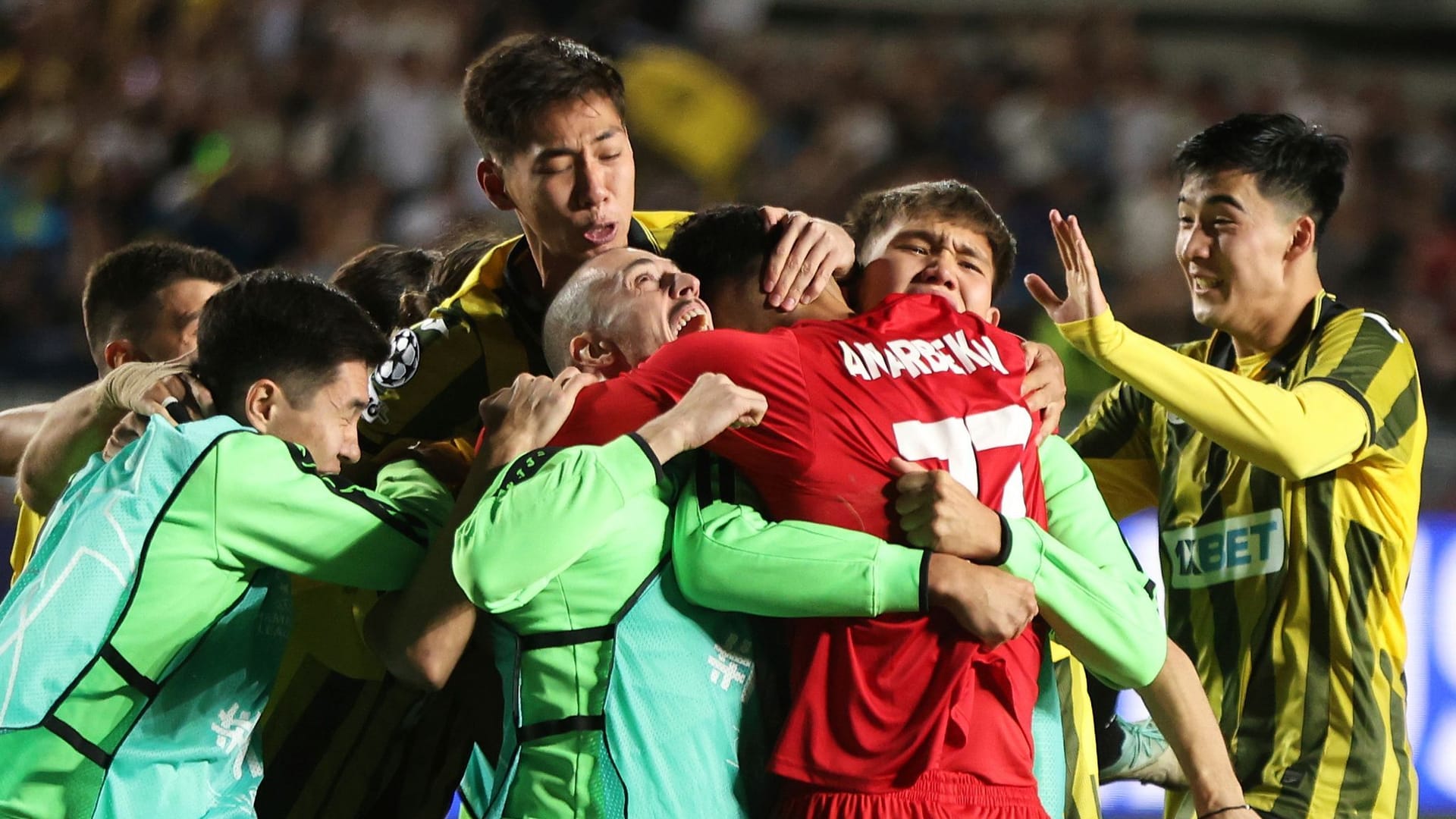 Cheers at Almaty: They prevailed against Celtic Glasgow.