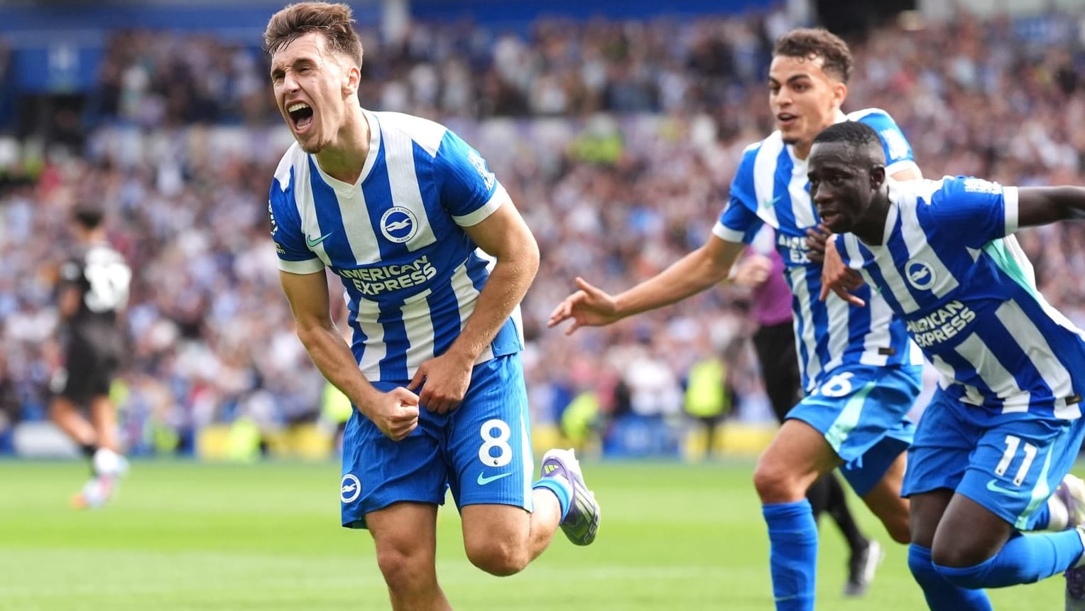 Match winner: Brightons Gruda (left) turns off after his goal against Manchester City.