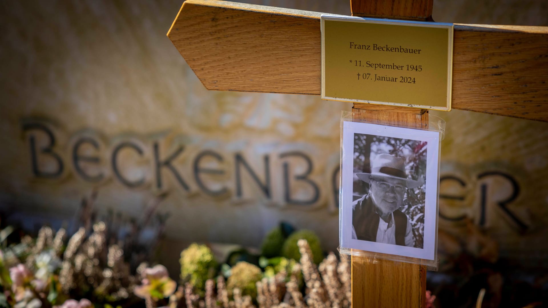 The final resting place of Franz Beckenbauer. The simple wooden cross is still at the grave. The tombstone is now different.