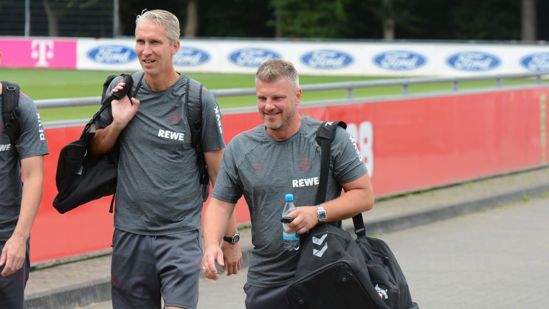Lukas Kwasniok, coach of 1. FC Köln, and assistant Frank Kaspari on the way to departure before the cup game at SSV Jahn Regensburg.