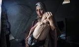 The 18 -month -old Muhammad and his mother in Gaza.