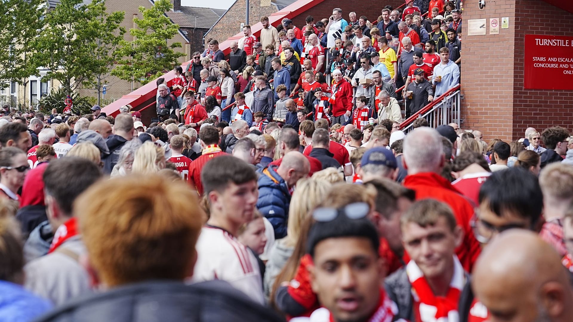 Fans leave the stadium on the Anfield Road: A Liverpool FC is set there.