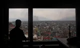 Above Kathmandu, a cloud of smoke increases due to the protests of Tuesday 9 September. 