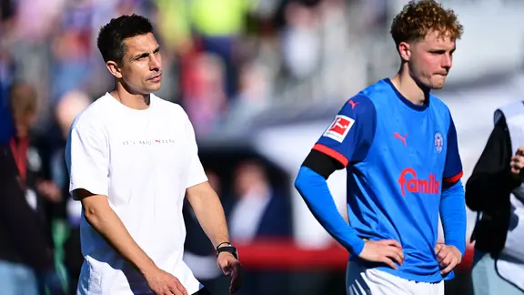 Kiel coach Marcel Rapp (left) and Finn Porath are frustrated.