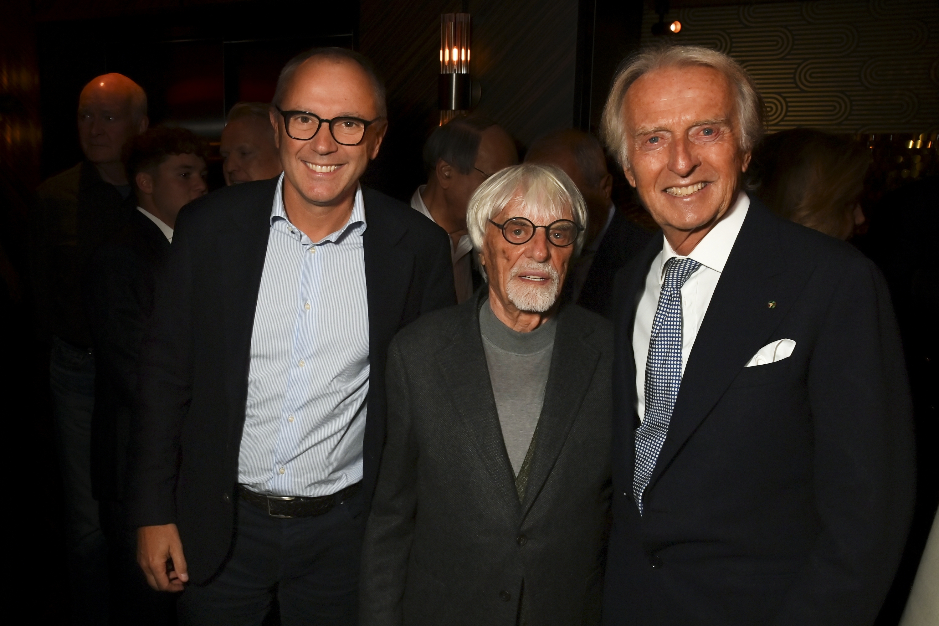 London, England - September 25: (l to r) Stefano Domenicali, CEO of the Formula One Group ,, Bernie Ecclestone and Luca Cordero di Montezemolo at least 