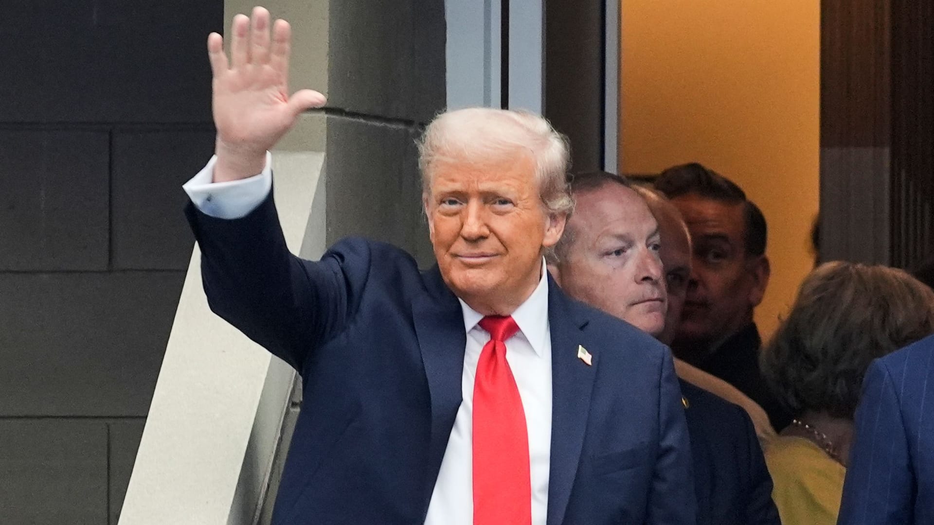 Tired wave: US President Donald Trump at the Arthur Ashe Stadium.