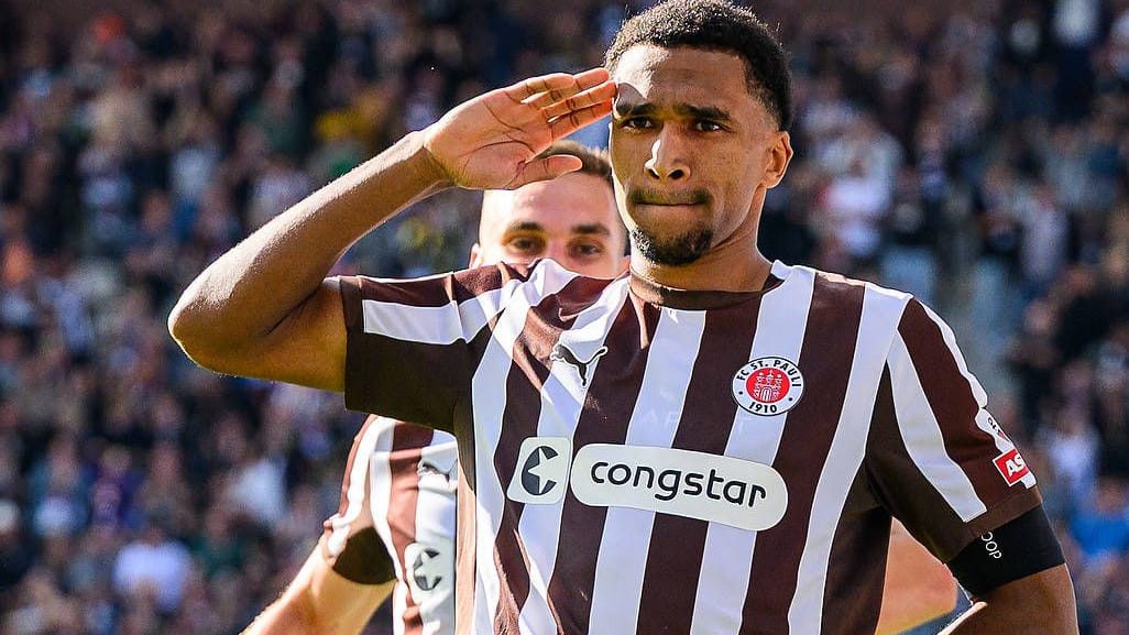 Andreas Hountondji celebrates his goal for 1-1: Benin's striker scored in every Bundesliga game this season.