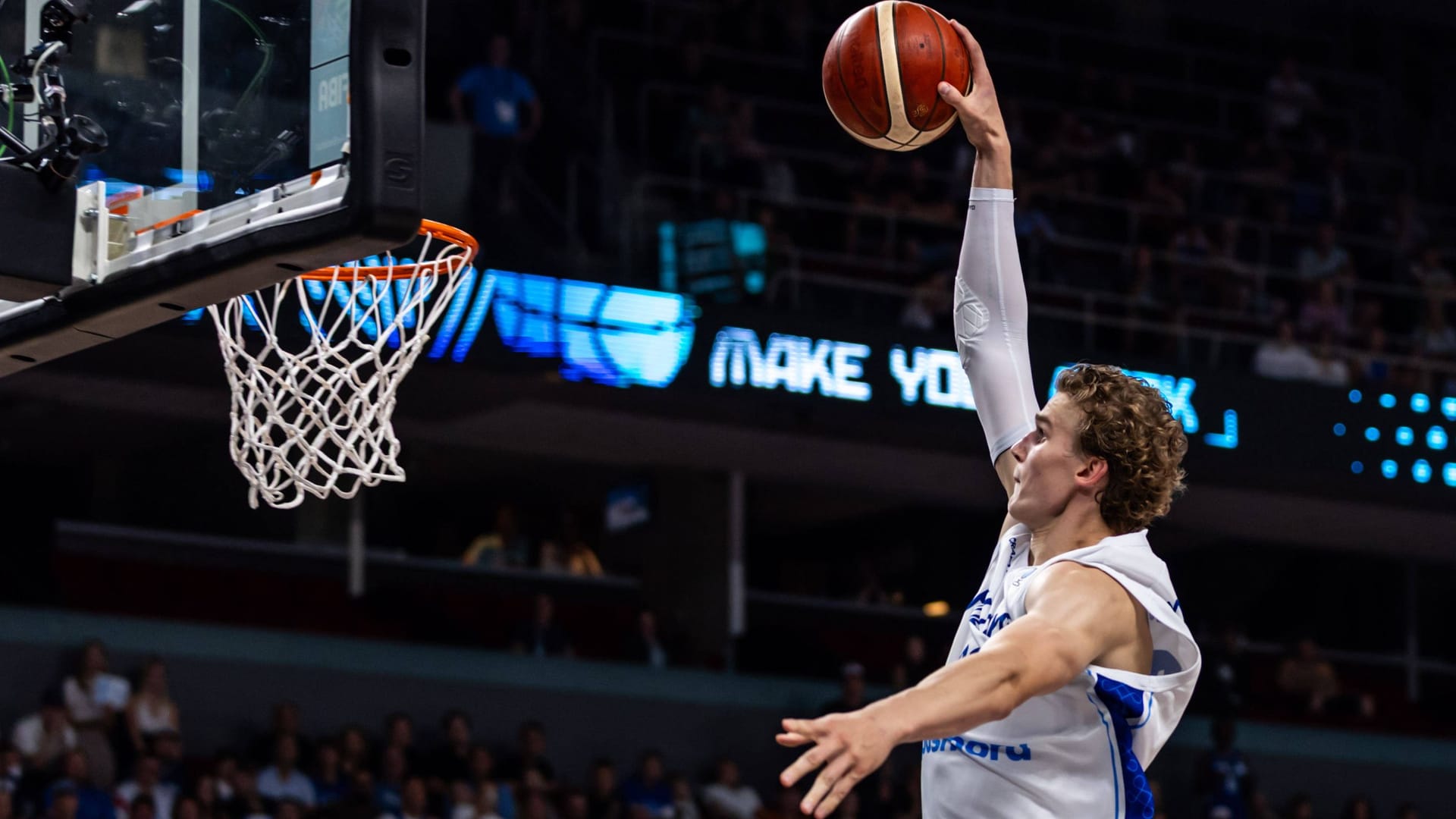 High -flyer: Finland's Lauri Markkanen in the game against Georgia at the end.