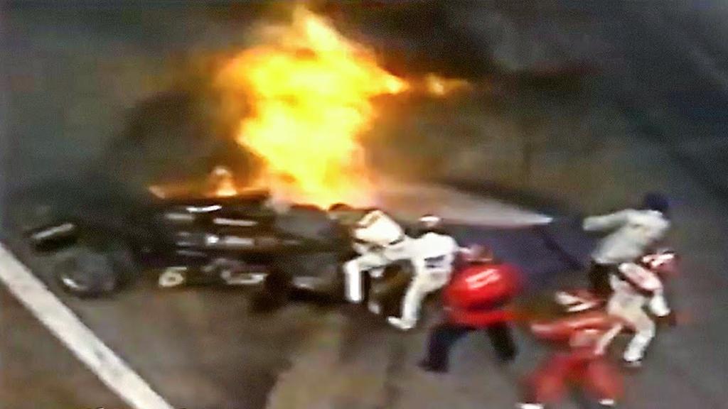 Dramatic scenes: James Hunt pulls Ronnie Peterson out of his burning lotus