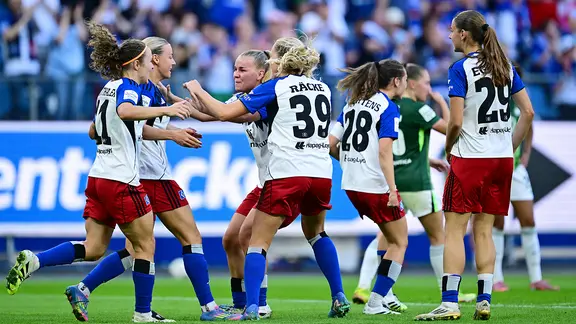 Hamburg's players cheer.