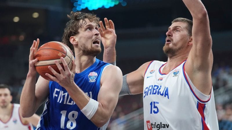 On the defensive: Serbia's superstar Nikola Jokić (right) against Finland's Mikael Jantunen.