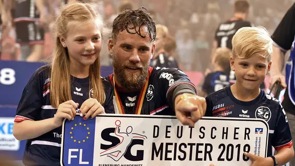 Thomas Mogensen with his children