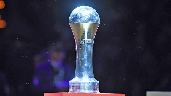 The cup is in the middle circle.