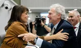 Mei Li Vos (GroenLinks-PvdA) is congratulated by Paul Rosenmoller (GroenLinks-PvdA) after being elected new chairman of the Senate. 