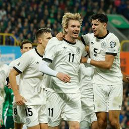Nick Woltemade celebrates his goal with Pavlovic 