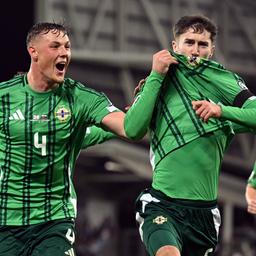 Northern Ireland's Trai Hume (m.) celebrates the goal to make it 2-0
