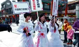 Li Tingting (center), one of five feminists arrested, at a 2012 protest against domestic violence.
