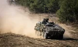 A Boxer armored vehicle in the Schnoggerbörg training village during Bastion Lion, the largest exercise of the Royal Netherlands Army this year.