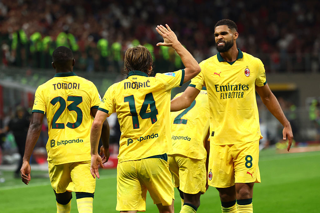 MILAN, ITALY - SEPTEMBER 14: Luka Modric of AC Milan celebrates with Ruben Loftus-Cheek after scoring his team's first goal during the Serie A match between AC Milan and Bologna FC 1909 at Giuseppe Meazza Stadium on September 14, 2025 in Milan, Italy. (Photo by Giuseppe Cottini/AC Milan via Getty Images)