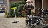 A voter in front of the polling station in the Maranatha Church in Woerden, known for its average results.