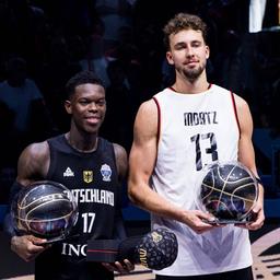 Germany's Dennis Schröder and Franz Wagner at the award ceremony for the best 5 of the European Championships
