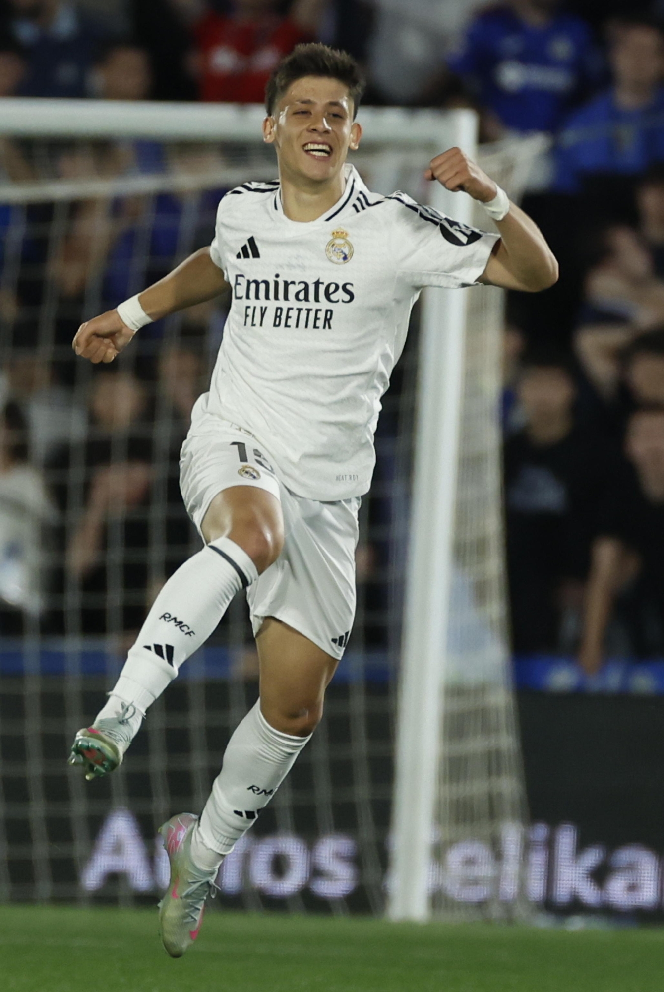 epa12050037 Real Madrid's Arda Guler celebrates after scoring the 0-1 goal during the Spanish LaLiga soccer match between Getafe CF and Real Madrid, in Madrid, Spain, 13 April 2025. EPA/JUANJO MARTIN