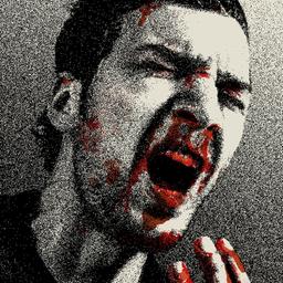 Soccer player with a face distorted in pain and a bleeding nose