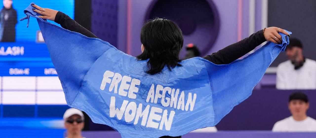 Afgahnin Manizha Talash with the inscription "Free Afghanistan Women" on her jacket