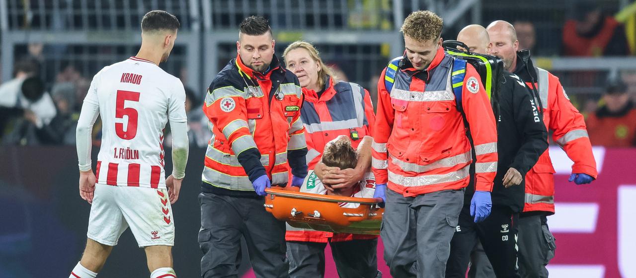 Timo Hübers is carried off the field injured