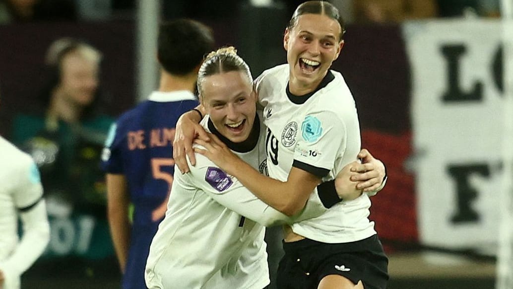 Redemption: Germany's goalscorer Bühl (r.) celebrates with teammate Kett.