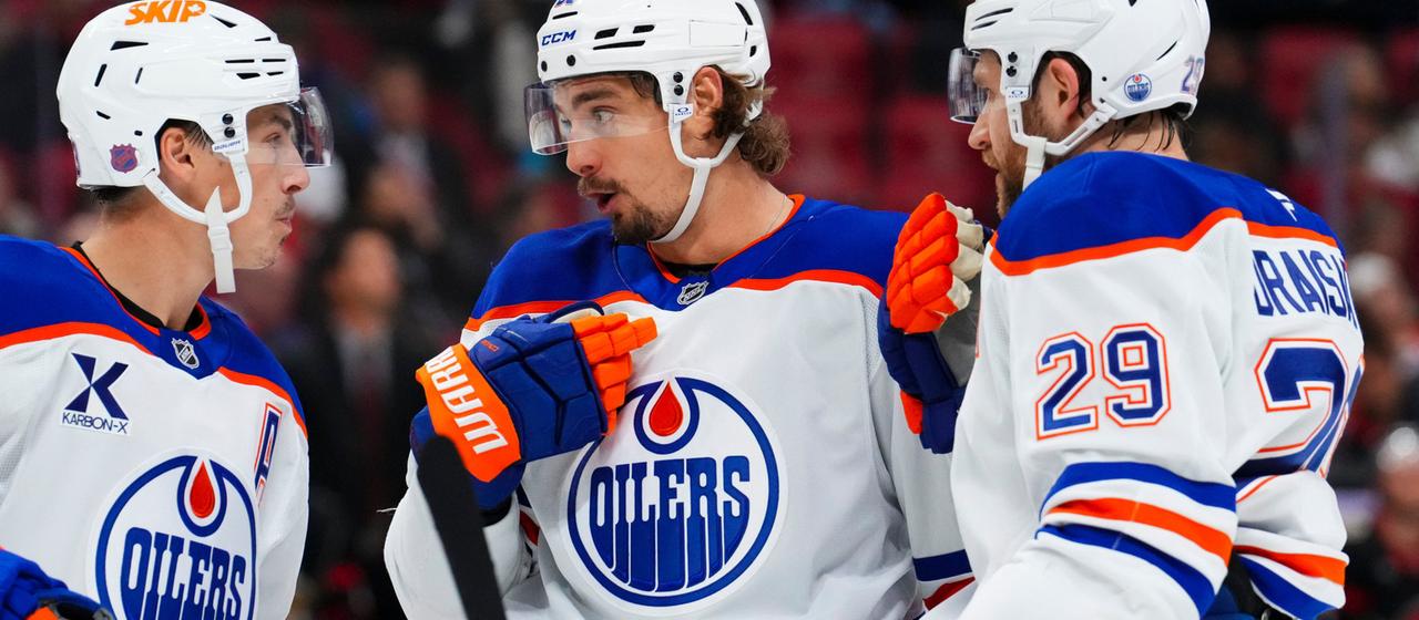 Oilers player Ryan Nugent-Hopkins (from left) with David Tomasek and Leon Draisaitl