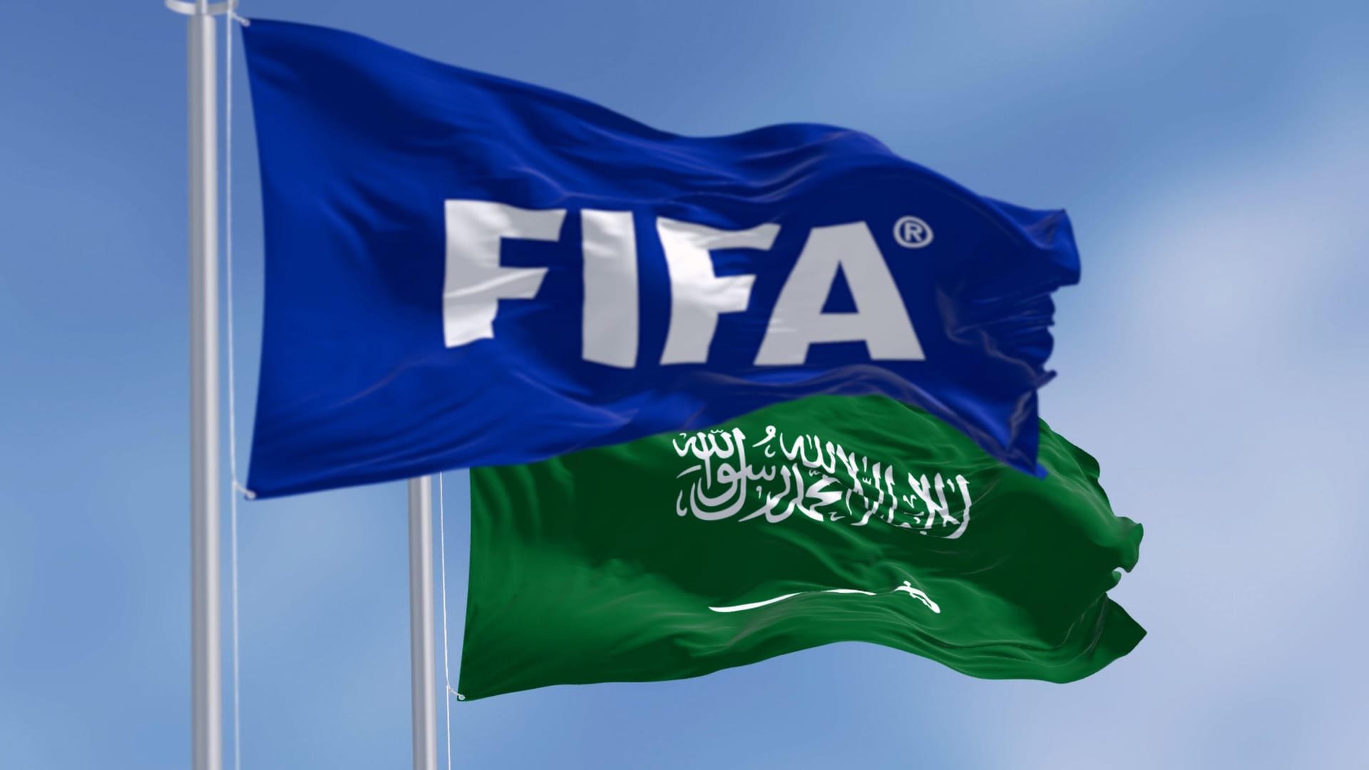 FIFA and Saudi Arabian flags waving in the wind