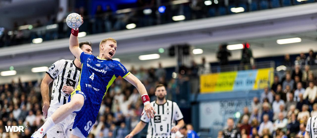 Ellidi Snaer Vidarsson from VfL Gummersbach throws at the goal in the game against THW Kiel.