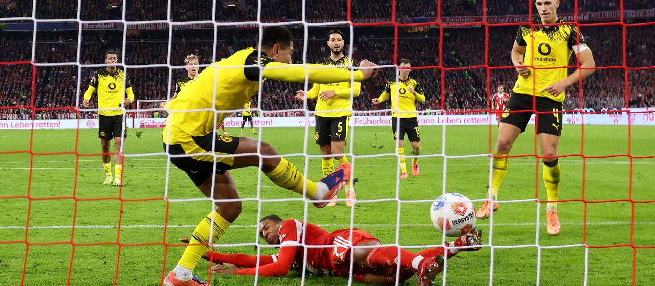 Bayern's Michael Olise makes it 2-0 with a tackle